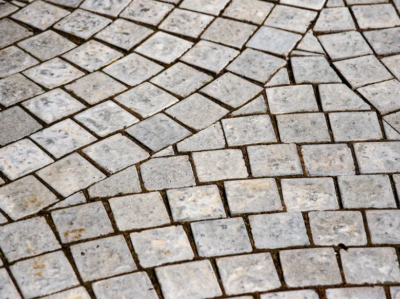 Granite cobble set in a tight fan pattern